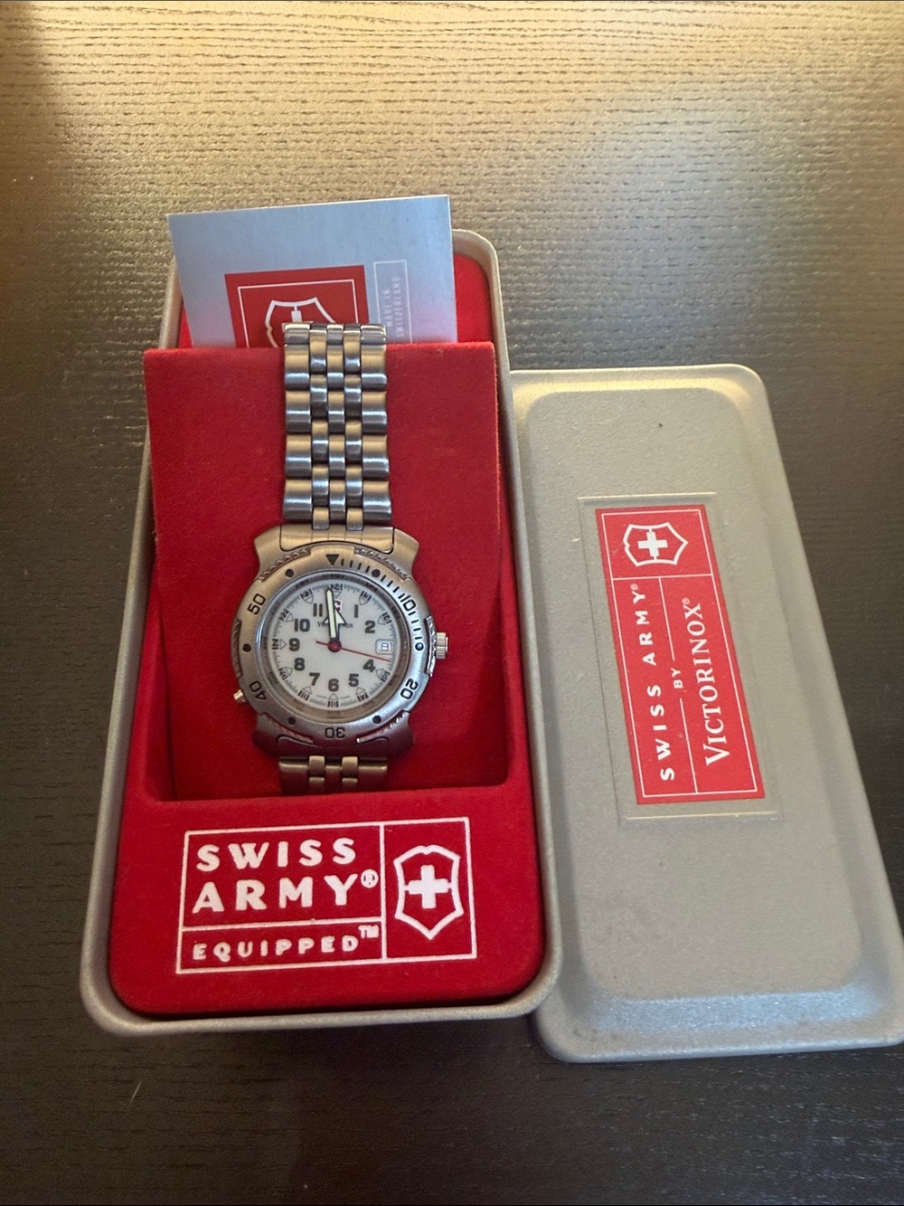 Victorinox Stainless Steel Watch with White Dial and Red Box Accents